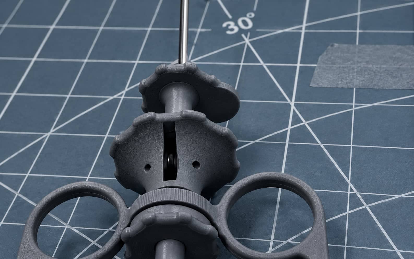 Close-up of the YouStay handle's control wheels and finger rings